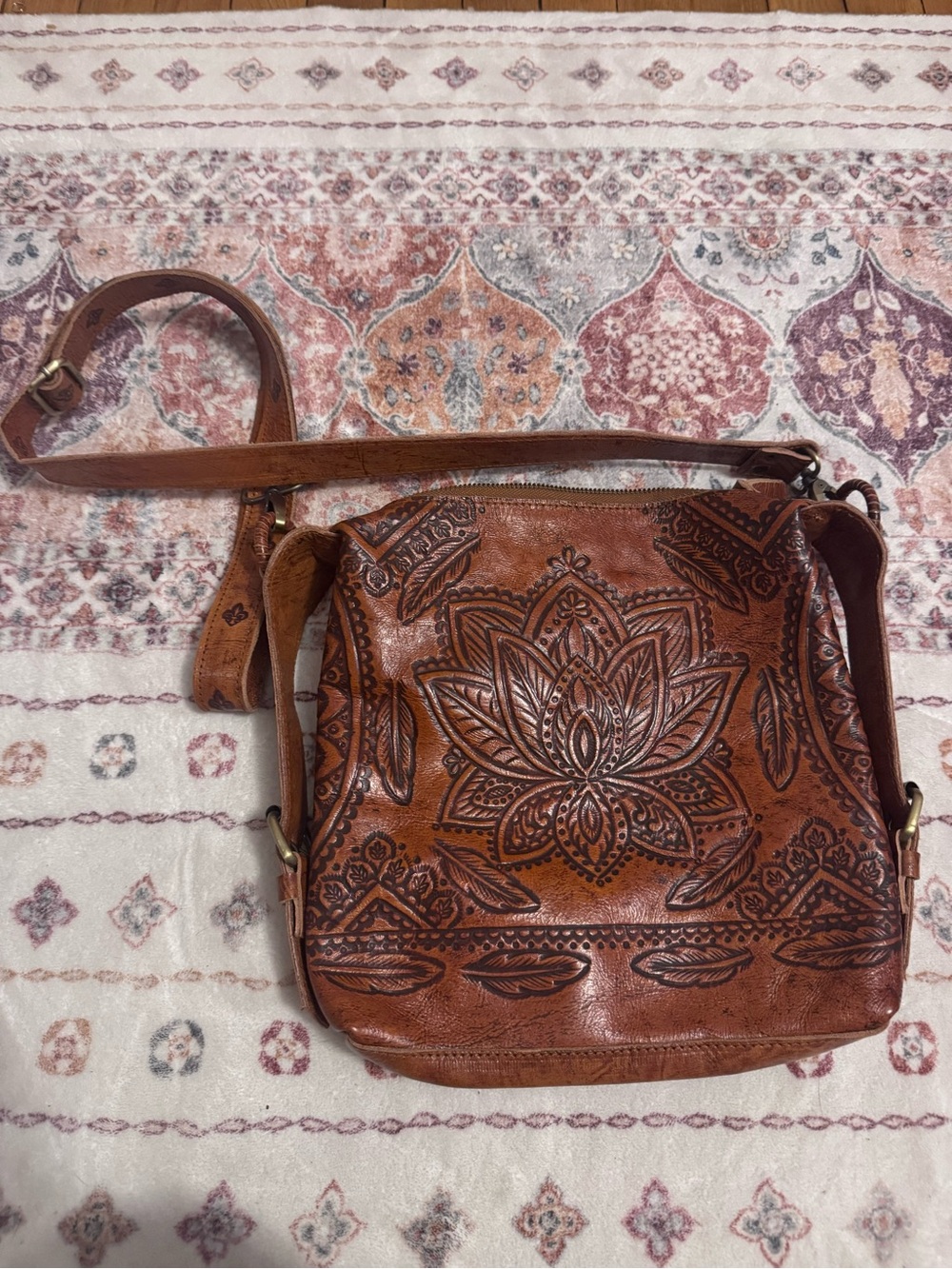 Artisan Embossed Leather Crossbody Bag in Brown